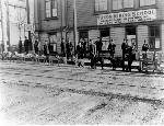 Sled dogs in front of Yukon Mining School