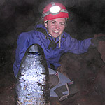 Visitor enjoys fantastic ice formations in Crystal Ice Cave