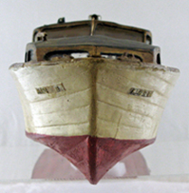 wooden model boat, viewed from the bow end
