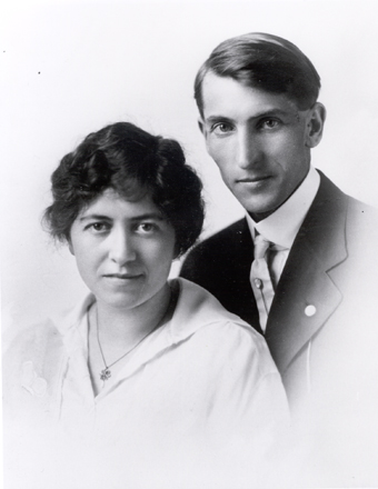 Black and white portrait-style photo of a man and woman