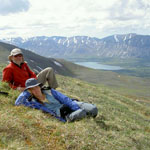 Hikers enjoy a rest along the historic Telaquana Trail route.