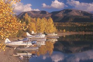 Floatplanes on Lake Clark's Hardenburg Bay, in front of Port Alsworth.