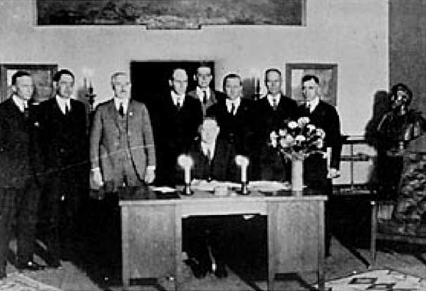 Commerce Secretary Herbert Hoover presides over the signing of the Colorado River Compact