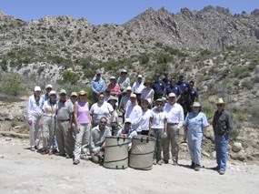 resource volunteers gather for a group picture after collecting blackbrush seeds