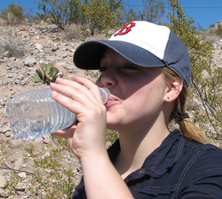Vistor to the park drinking water