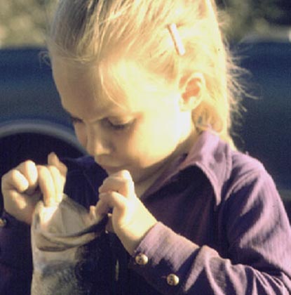 Photo of small girl with fish - link to fishing page