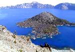 view from caldera with blue lake and island