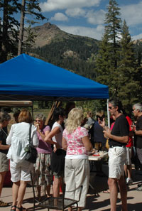 Visitor sample wine on the Kohm Yah-mah-nee Visitor Center patio