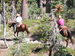 two horseback riders on summit lake trail