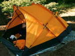 orange tent setup for camping