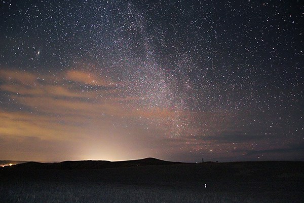 Light pollution and the milky way can both be seen at night at the monument.