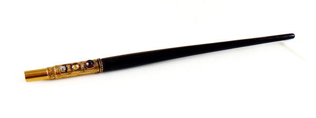 A pen made with wood from the USS Constitution and semiprecious stones from Maine, Russia and Sri Lanka, given to Henry Wadsworth Longfellow in 1879.