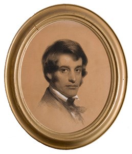 Bust-length portrait of man in charcoal and chalk in oval gold frame
