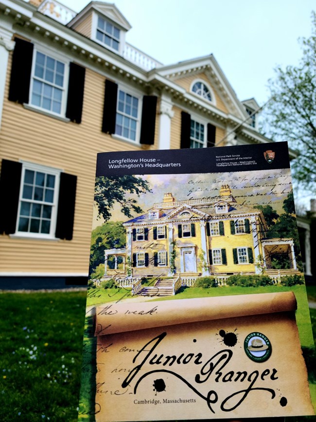 Front cover of the Junior Ranger book, in front of the Longfellow House