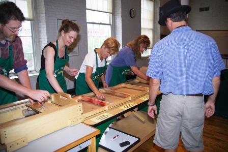 Educators participate in the "Workers on the Line" studio at "Teacher to Teacher" workshop