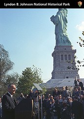 President Johnson with Statue of Liberty