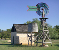 Johnson Settlement cooler house and windmill