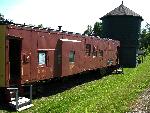 red caboose, green water tank