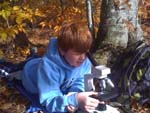 Student using microscope