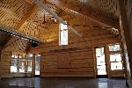 Interior wood paneling shines warmly.