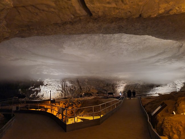 A large cloud forms on the ceiling of the cave.