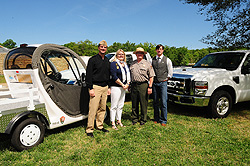 Officials with electric- and propane-powered vehicles