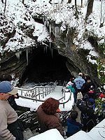 Visitors enter Mammoth Cave's Historic Entrance for a winter season tour