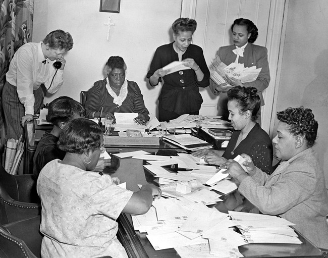 Mrs. Bethune and NCNW members preparing mailout