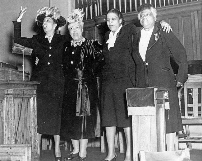 Eunice Hunton Carter, second from right, with, from left, Ella Moten, Daisy Lampkin, and Mary McLeod Bethune