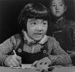 Young girl studying drawing