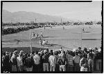 Spectators watch a baseball game