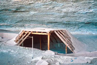 View of pithouse reconstruction in the Step House alcove.