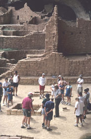 Visitors on a guided tour of Long House