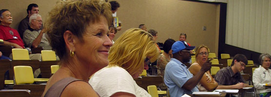 Teachers attend curriculum workshop.