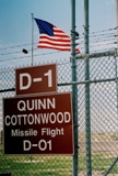 The Stars and Stripes fly at Delta-01