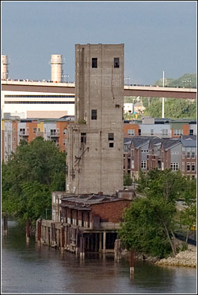 An old concrete tower on the edge of the Mississippi River.