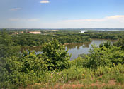 The Mississippi River winds its way through a floodplain forest below the Twin Cities.