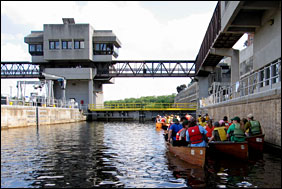 The Mississippi River flows through the locks of Lock and Dam 1.