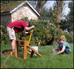 Archeologists excavate an STP at the Thomas Farm.
