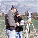 Monocacy archeologists conduct a survey using a total station.