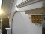 8) Newly repaired dentils in place