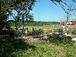 2) Masons work on stabilizing the blacksmith shop