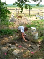 An archeologist works at a dig site.