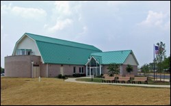 Monocacy National Battlefield Visitor Center: barn shaped building with green roof.