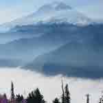 Smoke from the Carbon Copy Fire, outside the northwest park boundary, filters the view of Mount Rainier.