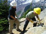 Rebuilding rock walls at Sunrise