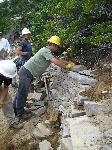 Rebuilding rock walls at Sunrise