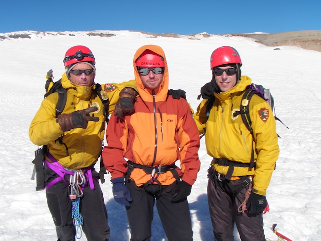 Nick Hall (center) with fellow Mount Rainier National Park Climbing Rangers.