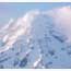 A view of a snow covered Mount Rainier.