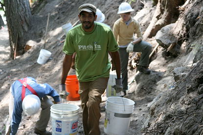 A volunteer works on a rebuilt section of the Wonderland Trail north of Cougar Rock Campground